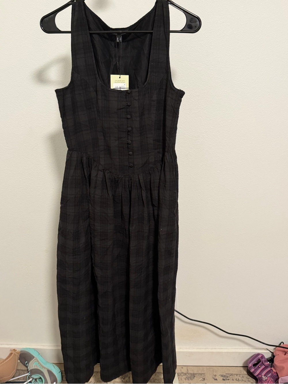 Sleeveless Black Midi Dress with Button-Front Bodice